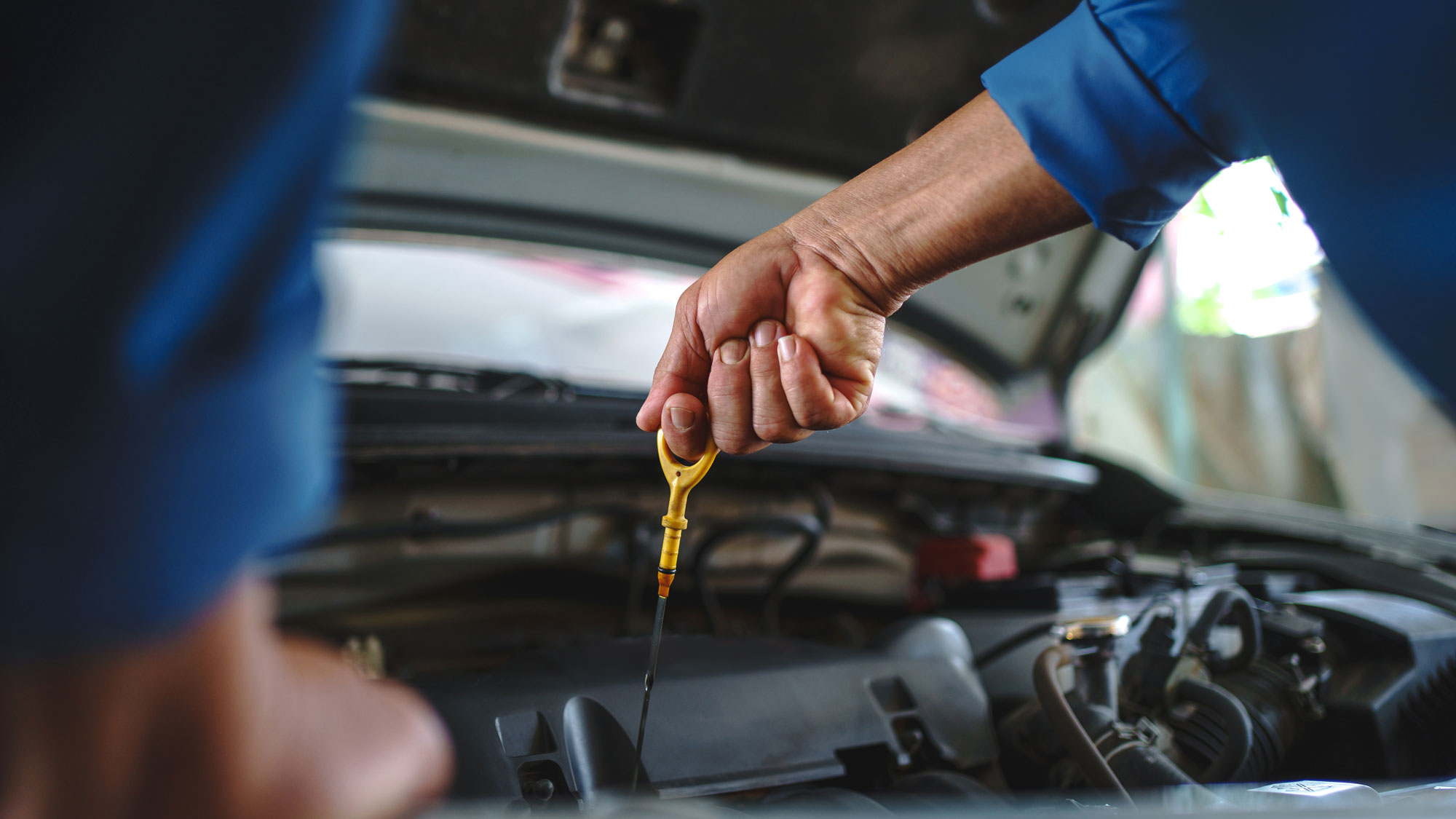 Boise Automotive Service mechanic inspecting engine — trusted auto repair in Boise, Idaho